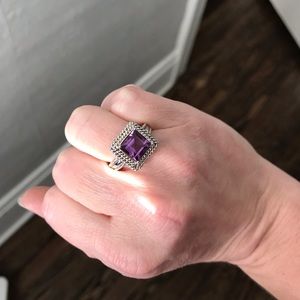 Silver ring with purple stone
